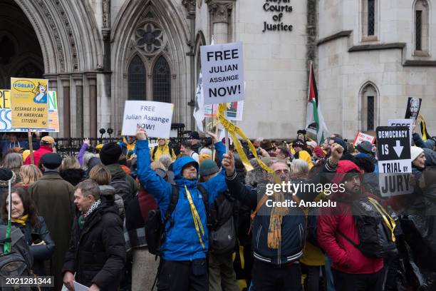 Supporters of Julian Assange demonstrate outside the Royal Courts of Justice as the second day of Assange's final appeal hearing at the High Court...