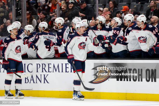 Zach Werenski of the Columbus Blue Jackets celebrates his goal with teammates during the first period against the Anaheim Ducks at Honda Center on...