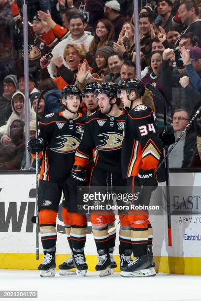 Mason McTavish of the Anaheim Ducks celebrates his goal with teammates during the second period against the Columbus Blue Jackets at Honda Center on...