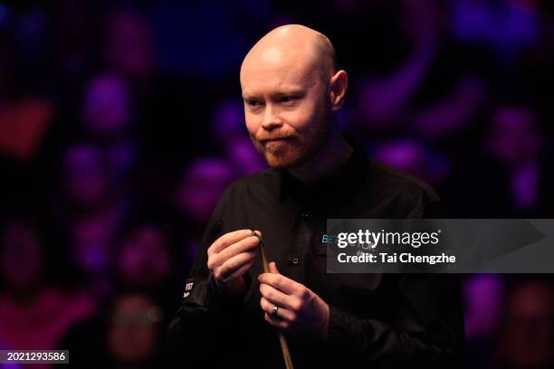 Gary Wilson of England reacts in the Final match against Martin O'Donnell of England on day seven of 2024 Betvictor Welsh Open at Venue Cymru on...