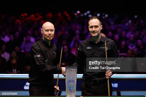 Gary Wilson of England and Martin O'Donnell of England pose for a photo with the trophy prior to the Final match on day seven of 2024 Betvictor Welsh...