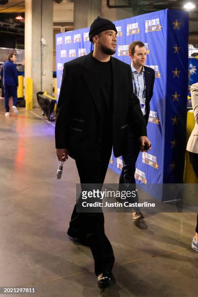 Devin Booker of the Phoenix Suns and Western Conference All-Stars arrives prior to the 2024 NBA All-Star Game at Gainbridge Fieldhouse on February...