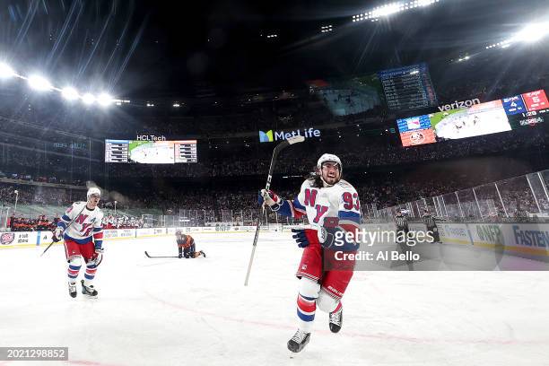 Mika Zibanejad of the New York Rangers celebrates after scoring the game-tying goal against the New York Islanders during the third period during the...