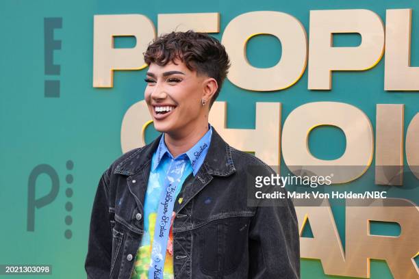 Pictured: James Charles arrives to the 2024 People's Choice Awards held at Barker Hangar on February 18, 2024 in Santa Monica, California. --