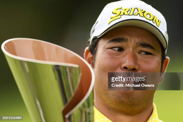 Hideki Matsuyama of Japan reacts after being asked to kiss the trophy during the final round of The Genesis Invitational at Riviera Country Club on...