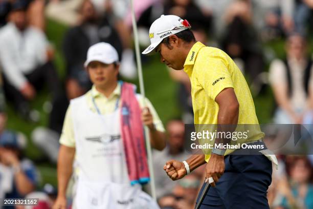 Hideki Matsuyama of Japan celebrates by fist pumping as he finishes his round 17 under during the final round of The Genesis Invitational at Riviera...
