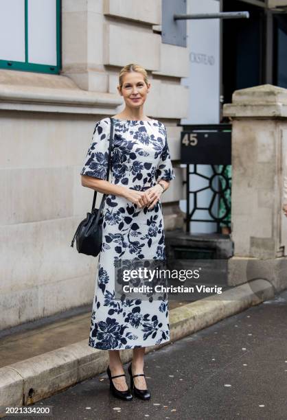 Kelly Rutherford wears white dress with blue flower print outside Emilia Wickstead during London Fashion Week February 2024 on February 18, 2024 in...