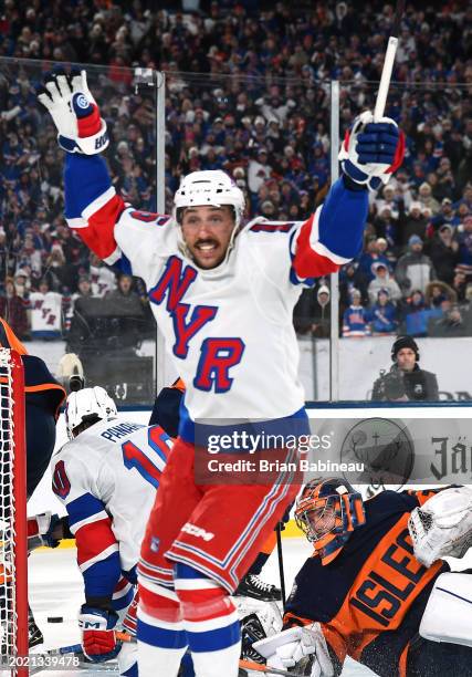 Vincent Trocheck of the New York Rangers reacts after an overtime game-winning goal was scored by teammate Artemi Panarin as Ilya Sorokin of the New...