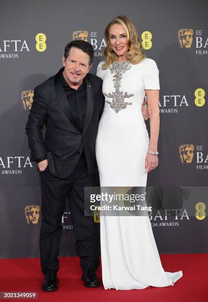 Michael J. Fox and Tracy Pollan attend the 2024 EE BAFTA Film Awards at The Royal Festival Hall on February 18, 2024 in London, England.