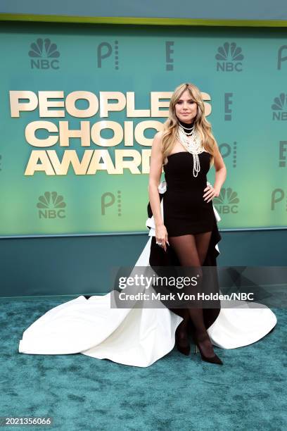 Pictured: Heidi Klum arrives to the 2024 People's Choice Awards held at Barker Hangar on February 18, 2024 in Santa Monica, California. --