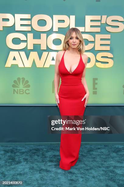 Pictured: Sydney Sweeney arrives to the 2024 People's Choice Awards held at Barker Hangar on February 18, 2024 in Santa Monica, California. --