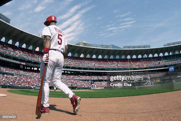 Left fielder Albert Pujols of the St. Louis Cardinals walks to the on-deck circle during the game against the Milwaukee Brewers at Busch Stadium on...