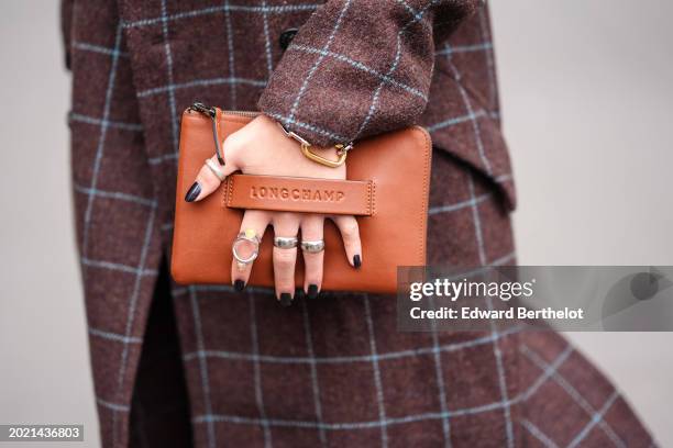 Close-up detail view of a brown leather Longchamp bag, outside Altuzarra, during New York Fashion Week, on February 11, 2024 in New York City.