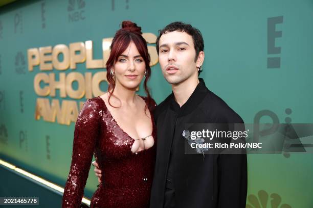 Pictured: Emily Cannon and MAX arrive to the 2024 People's Choice Awards held at Barker Hangar on February 18, 2024 in Santa Monica, California. --