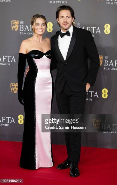Margot Robbie and Tom Ackerley attend the 2024 EE BAFTA Film Awards at The Royal Festival Hall on February 18, 2024 in London, England.