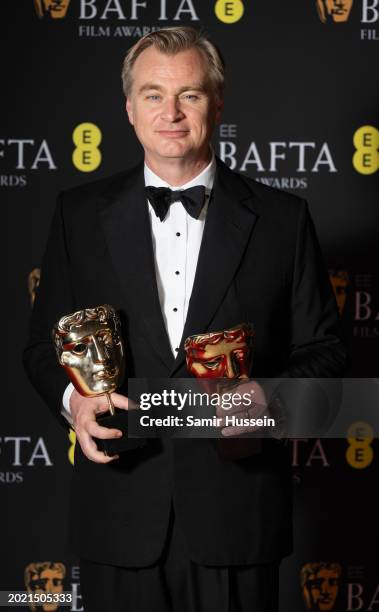 Christopher Nolan poses with the Best Film Award for 'Oppenheimer' in the Winners Room during the EE BAFTA Film Awards 2024 at The Royal Festival...