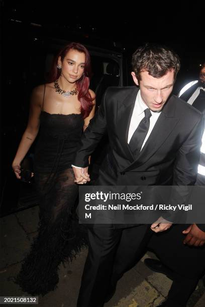 Dua Lipa and Callum Turner attend the British Vogue And Tiffany & Co. Celebrate Fashion And Film Party 2024 at Annabel's on February 19, 2024 in...
