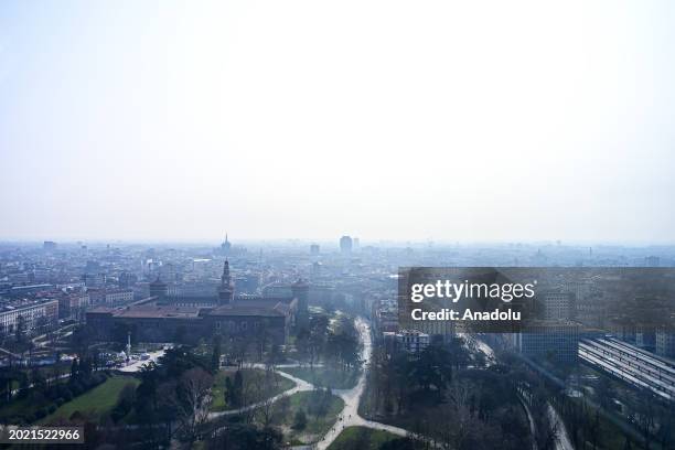 An aerial view of downtown Milan and the Duomo Cathedral during heavy pollution in Milan, Italy on February 21, 2024. The city is facing dangerous...