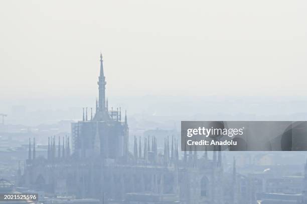 An aerial view of downtown Milan and the Duomo Cathedral during heavy pollution in Milan, Italy on February 21, 2024. The city is facing dangerous...