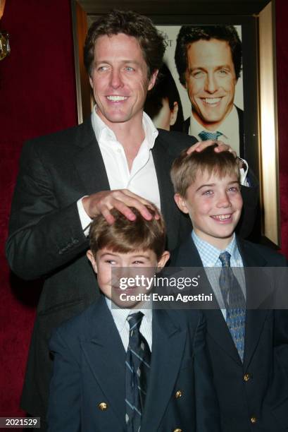 British actor Hugh Grant poses with his nephews at the New York Premiere of the film, 'Two Weeks Notice,' at The Ziegfeld Theatre, New York City,...