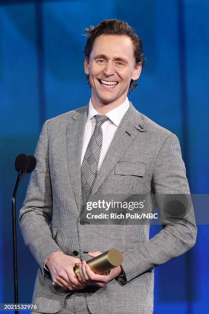Pictured: Tom Hiddleston speaks onstage during the 2024 People's Choice Awards held at Barker Hangar on February 18, 2024 in Santa Monica,...