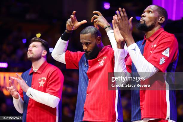 LeBron James of the Los Angeles Lakers and Western Conference All-Stars reacts prior to the start of the 2024 NBA All-Star Game at Gainbridge...