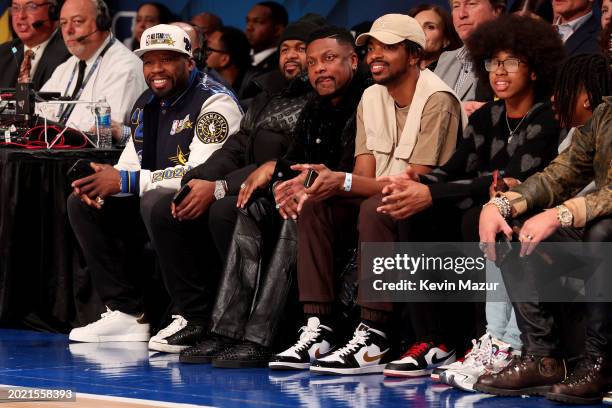 Cent, Anthony Wilson, Chris Tucker, Destin Christopher Tucker, and David Daniel Otunga Jr. Sit courtside during the 73rd NBA All-Star Game at...