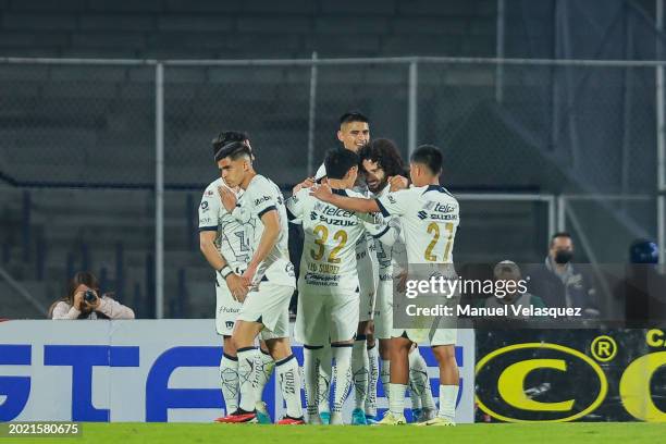 Leonardo Suárez of Pumas celebrates with his teammates after scoring the team's third goal during the 7th round match between Pumas UNAM and Santos...