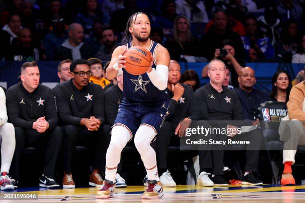 Donovan Mitchell of the Cleveland Cavaliers and Eastern Conference All-Stars dribbles the ball against the Western Conference All-Stars in the first...