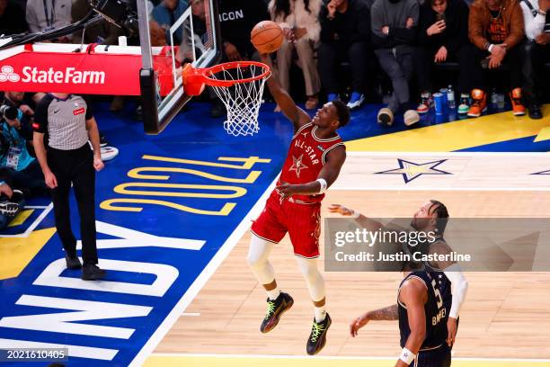 Anthony Edwards of the Minnesota Timberwolves and Western Conference All-Stars drives to the basket against the Eastern Conference All-Stars in the...