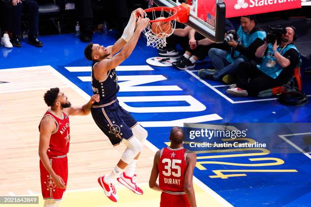 Giannis Antetokounmpo of the Milwaukee Bucks and Eastern Conference All-Stars dunks the ball against the Western Conference All-Stars in the second...