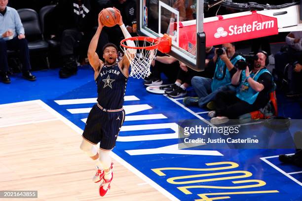 Giannis Antetokounmpo of the Milwaukee Bucks and Eastern Conference All-Stars dunks the ball against the Western Conference All-Stars in the second...