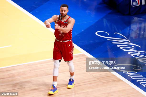 Stephen Curry of the Golden State Warriors and Western Conference All-Stars reacts in the second quarter against the Eastern Conference All-Stars...