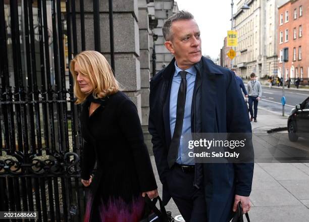 Dublin , Ireland - 22 February 2024; FAI chief executive Jonathan Hill, right, and FAI independent director Catherine Guy arrive at Dáil Éireann in...