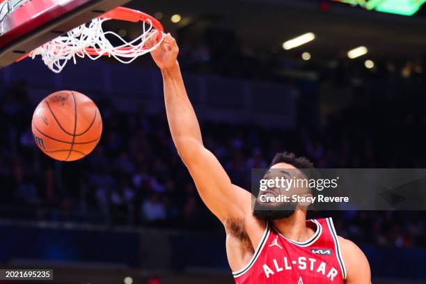 Karl-Anthony Towns of the Minnesota Timberwolves and Western Conference All-Stars dunks the ball against the Eastern Conference All-Stars in the...