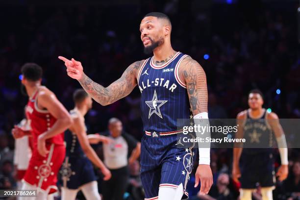 Damian Lillard of the Milwaukee Bucks and Eastern Conference All-Stars reacts in the fourth quarter against the Western Conference All-Stars during...