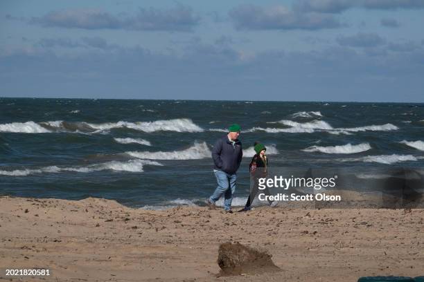 Waves roll toward the shore on Lake Michigan on February 18, 2024 in St. Joseph, Michigan. The Great Lakes shorelines have historically been...