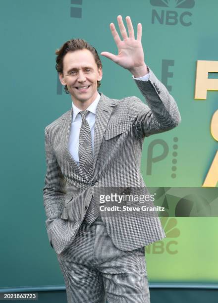 Tom Hiddleston arrives at the 2024 People's Choice Awards at Barker Hangar on February 18, 2024 in Santa Monica, California.