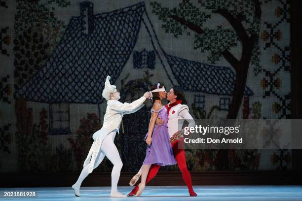 Chengwu Guo plays the role of White Rabbit ,Benedicte Bemet the role of Alice and Joseph Caley the role of Jack during a dress rehearsal for "Alice's...