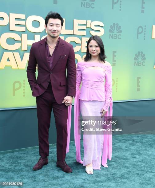 Simu Liu, Allison Hsuarrives at the 2024 People's Choice Awards at Barker Hangar on February 18, 2024 in Santa Monica, California.