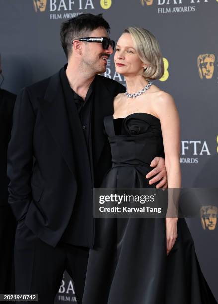 Marcus Mumford and Carey Mulligan attend the 2024 EE BAFTA Film Awards at The Royal Festival Hall on February 18, 2024 in London, England.