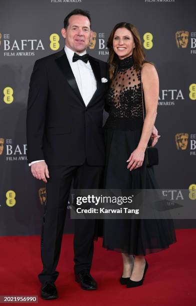 Johnnie Burn and Cathy Burn attend the 2024 EE BAFTA Film Awards at The Royal Festival Hall on February 18, 2024 in London, England.