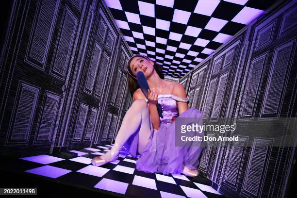 Benedicte Bemet performs the role of Alice during a dress rehearsal for "Alice's Adventures in Wonderland" at Capitol Theatre on February 19, 2024 in...