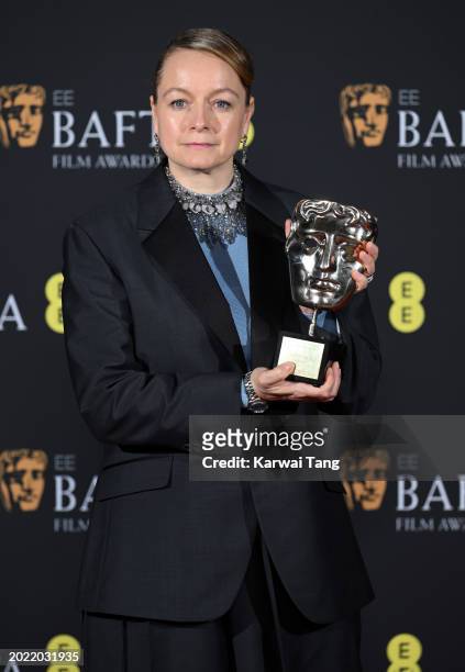 Samantha Morton poses in the winners room with the Fellowship Award during the 2024 EE BAFTA Film Awards at The Royal Festival Hall on February 18,...