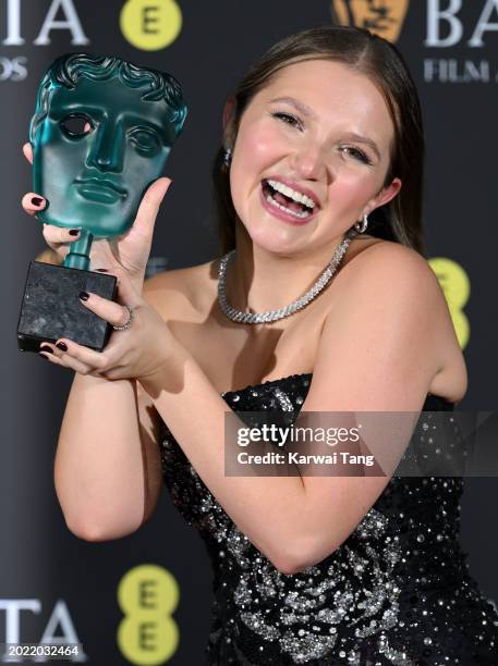 Mia Mckenna-Bruce poses with the EE Rising Star Award in the Winners Room during the EE BAFTA Film Awards at The Royal Festival Hall on February 18,...