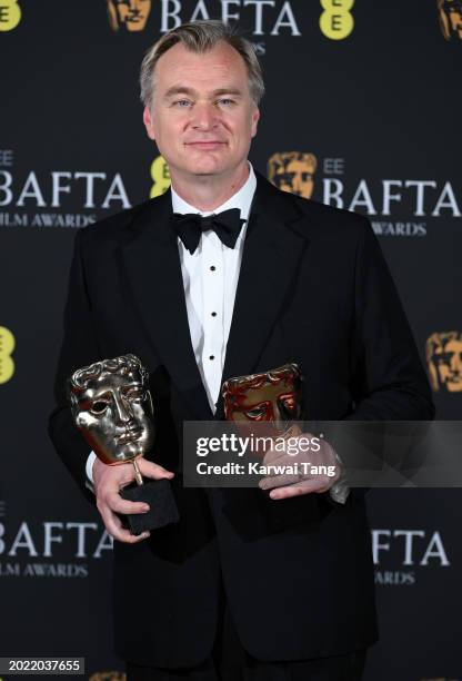 Christopher Nolan poses with the Best Film Award for 'Oppenheimer' in the Winners Room during the EE BAFTA Film Awards at The Royal Festival Hall on...