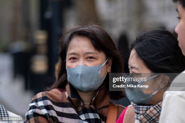 People wearing face masks to protect against Coronavirus / Covid-19 on 5th February 2024 in London, United Kingdom. The usage of face coverings in...