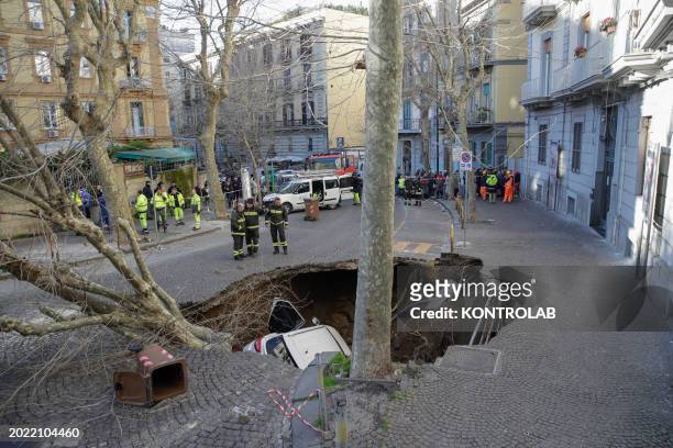 In the Vomero neighborhood of Naples, where two cars, one parked and the other in transit, were engulfed by a large sinkhole that opened in the San...
