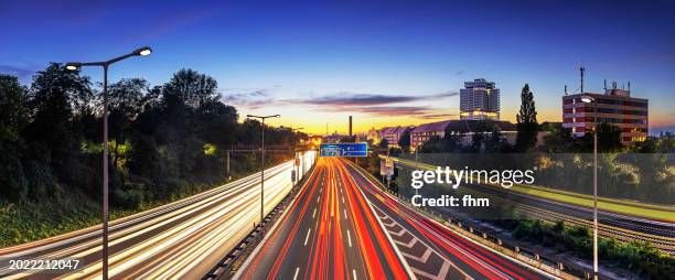 berlin city highway at sunset/ blue hour (germany) - street light banner stock pictures, royalty-free photos & images