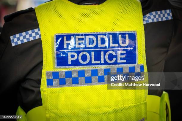 View of the back of a police officer on February 10, 2024 in Cardiff, Wales.